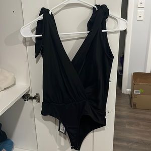 Black adjustable strap body suit